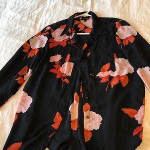 Long sleeved button down floral blouse